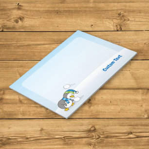 Little penguin getting a snow ball notepad