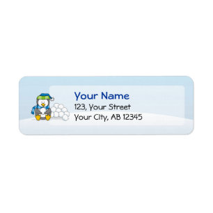 Little penguin sitting with snowballs