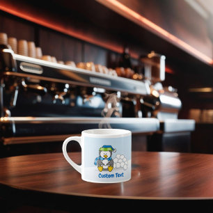 Little penguin sitting with snowballs espresso cup