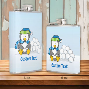 Little penguin sitting with snowballs hip flask