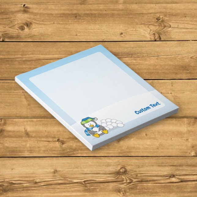 Little penguin sitting with snowballs notepad (Creator Uploaded)