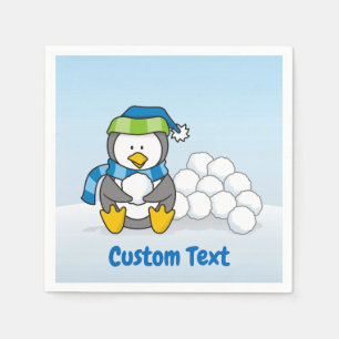 Little penguin sitting with snowballs paper napkin