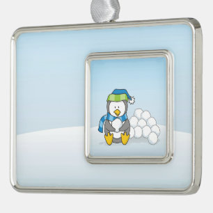 Little penguin sitting with snowballs silver plated framed ornament