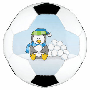 Little penguin sitting with snowballs soccer ball
