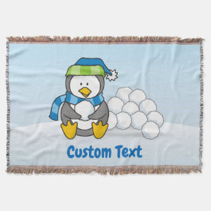 Little penguin sitting with snowballs throw blanke blanket
