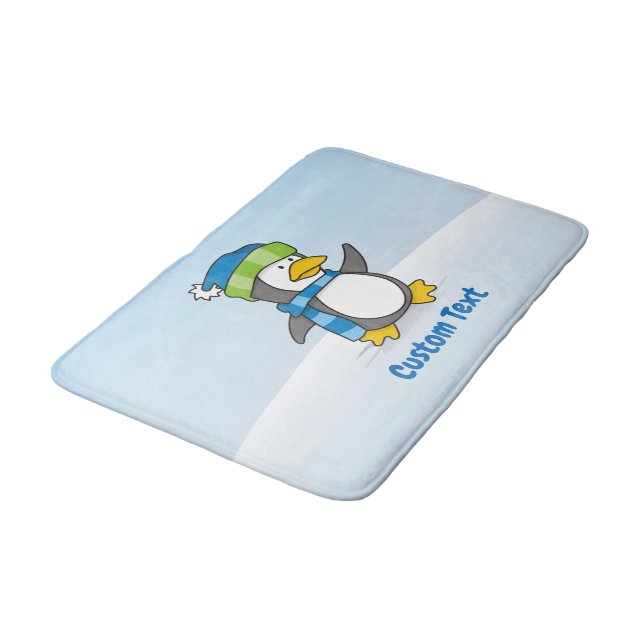 Little penguin walking on snow bath mat (Angled)