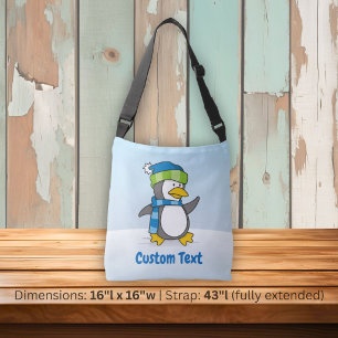 Little penguin walking on snow crossbody bag