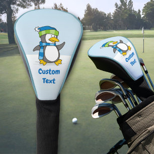 Little penguin walking on snow golf head cover