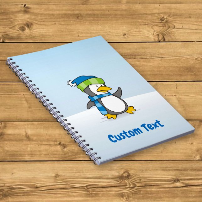 Little penguin walking on snow spiral notebook (Creator Uploaded)