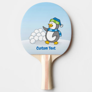 Little penguin with snow balls waving ping pong pa paddle