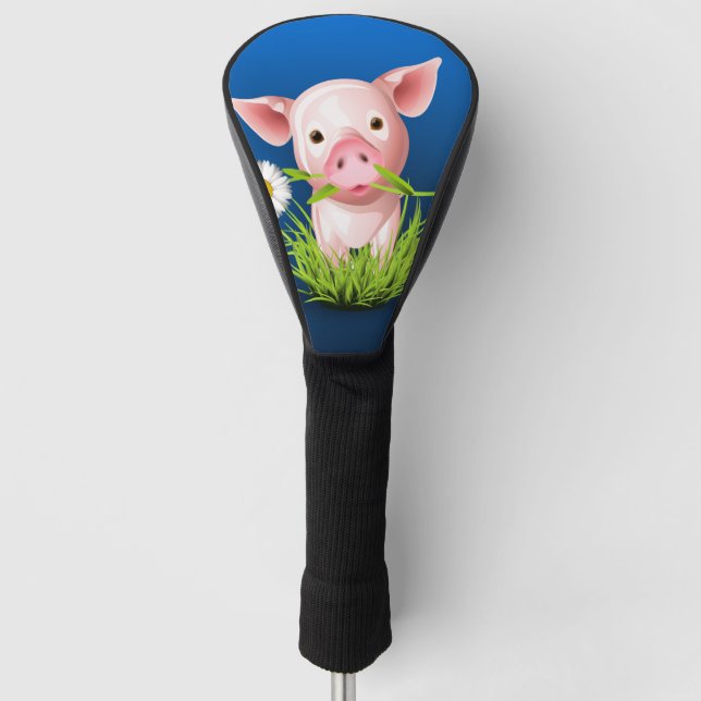 Little pink pig in green grass over blue golf head cover (Front)