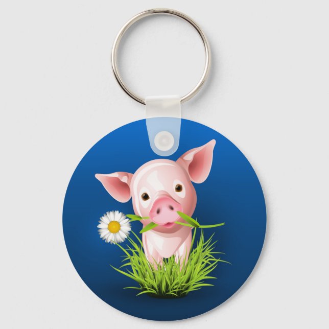 Little pink pig in green grass over blue key ring (Front)