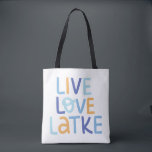 Live Love Latke Hanukkah Design Tote Bag<br><div class="desc">Celebrate the joy of Hanukkah with this colourful "Live Love Latke" design. Featuring bright colours and playful typography,  this graphic is perfect for a variety of products,  from home decor to gifts. Add a touch of holiday spirit and deliciousness to your space with this fun and festive design.</div>