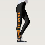 Live to Run! Run to Live! Black & Orange Running Leggings<br><div class="desc">These fun leggings are designed with runners in mind. They are black with bright high visibility orange coloured text running up each leg. One leg says "Live to Run!" the other leg says "Run to Live!" Perfect running tights and the colour is a safety measure to be sure you are...</div>