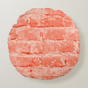 Living Coral. Brick wall background. Closeup horiz Round Cushion