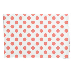 Living coral polka dots on white pillowcase