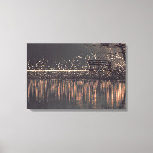 Lonely bench by the lake in the golden light canvas print
