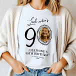 Look Who's Ninety Photo 90th Birthday Tri-Blend Shirt<br><div class="desc">Humourous 90th birthday t-shirt features a fun saying 'Look who's 90' with a clever twist - a personalised photo in place of zero. Surrounded by a doodley picture frame, this t-shirt sets the tone for a lively celebration. Plus, it comes with a simple text template that is easy to personalise,...</div>