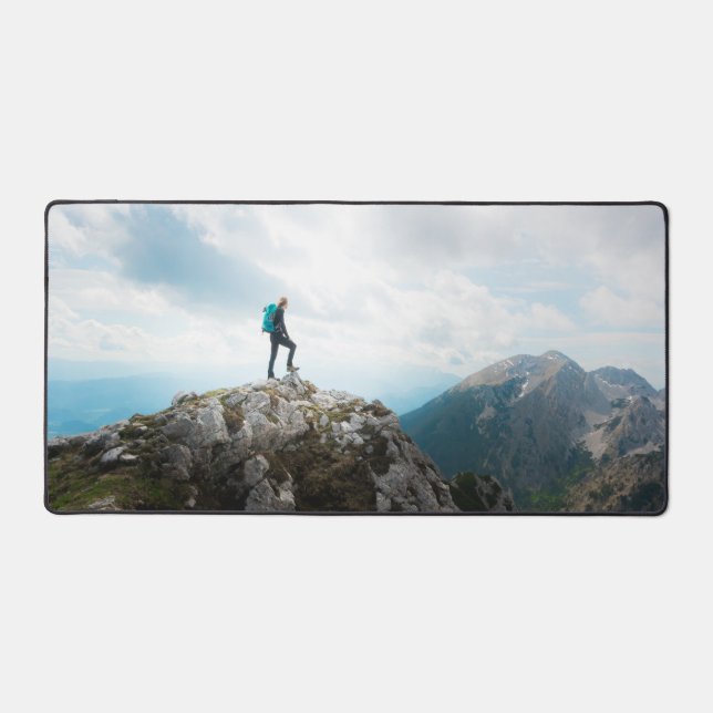 Looking over new adventures desk mat (Front)