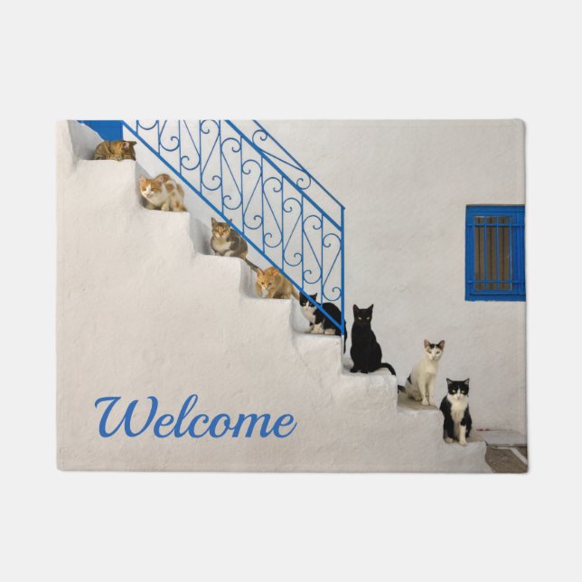 Lot of cats on a white stairway in a Greek village Doormat (Front)