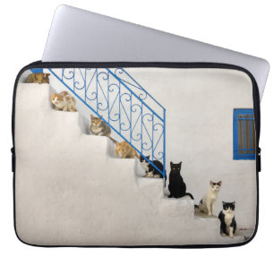 Lot of cats on a white stairway in a Greek village Laptop Sleeve