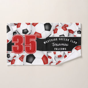 Lots of red black team colours soccer balls hand towel