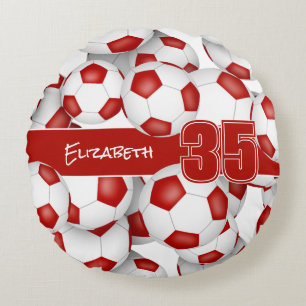 Lots of soccer balls red sports team colours round cushion