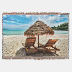 Lounge chairs on beach throw pillow blanket
