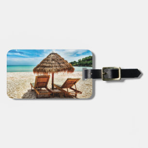 Lounge chairs on beach throw pillow luggage tag