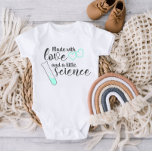 Love and Science IVF Quote Mint Green Black Text Baby Bodysuit<br><div class="desc">Step into the world of adorable charm with our exclusive baby bodysuit, where the magic of creation is beautifully captured in this delightful design. Emblazoned with the heartwarming phrase "Made with Love and a Little Science, " this unique design unfolds a tale of joy and wonder for your little one....</div>
