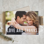Love and Thanks Modern Typography Photo Wedding Thank You Card<br><div class="desc">Share your gratitude in a simple, modern way with this horizontal photo wedding thank you postcard. Featuring a clean "LOVE AND THANKS" text overlay and minimalist typography, this design puts the focus on your favourite wedding photo. Easily personalise the card by adding your photo, names, and a custom message. The...</div>