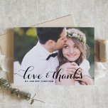 Love and Thanks Whimsical Script Photo Wedding Thank You Card<br><div class="desc">Send a thoughtful and personal note of appreciation with this custom horizontal photo wedding thank you card. Featuring a full-photo layout and a whimsical "love and thanks" calligraphy overlay, this design adds a romantic, artistic touch to your favourite wedding photo. Customise the card with your photo, names, and a short...</div>