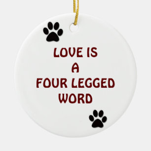 LOVE IS A 4 LEGGED WORD WITH PAWS ORNAMENT