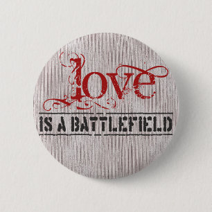 LOVE IS A BATTLEFIELD 6 CM ROUND BADGE