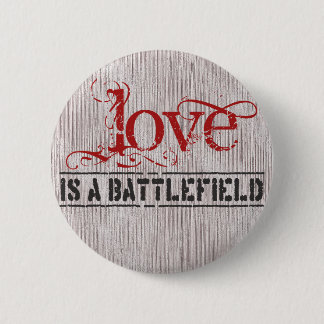 LOVE IS A BATTLEFIELD 6 CM ROUND BADGE