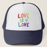 LOVE IS LOVE Colourful Rainbow Pride  Trucker Hat<br><div class="desc">Check out my shop for more pronouns, silly jokes, hiking, camping, vanlife, birds and lots more! You can also find this design on shirts, stickers, mugs, and buttons. Be sure to visit my shop for more designs too. Or if you'd like something custom please let me know. If you buy...</div>