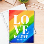 Love is Love Gay Pride Rainbow Planner<br><div class="desc">This Gay Pride Planner is decorated with LOVE IS LOVE in bold white typography on a watercolor rainbow background of red,  orange,  yellow,  green,  and blue.
Easy customisable with your name and year.
Original Watercolor © Michele Davies.</div>