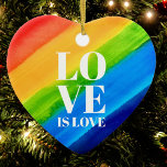 Love is Love Rainbow Gay Pride Heart Ceramic Tree Decoration<br><div class="desc">Love is love. Celebrate love,  equality,  and June Pride Month.
This Pride Ornament is heart-shaped and decorated with rainbow stripes and stylish white typography on a watercolor rainbow background of red,  orange,  yellow,  green,  blue,  and purple.
Original Watercolor © Michele Davies.</div>