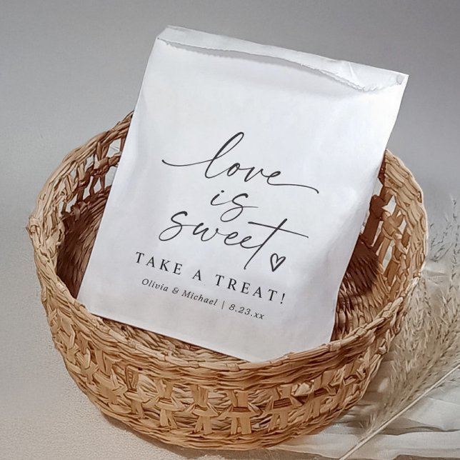 Love is Sweet Black and White Script Wedding Favour Bags (Modern black and white wedding favor bag with “Love Is Sweet” script and heart design)