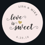 Love is Sweet Custom Script Wedding Favour Pink Classic Round Sticker<br><div class="desc">Custom-designed wedding candy buffet favour stickers featuring gold glitter heart and "Love is Sweet" in elegant hand brushed script/calligraphy. Personalise this wedding favour sticker with bride and groom's names and wedding date for a touch of style to your wedding favours and gifts.</div>