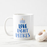 Love Light Lakes | Modern Fun Hanukkah  Coffee Mug<br><div class="desc">Discover a playful,  modern,  and vibrant Hanukkah Latkes Mug with double-sided printing. It features a minimalist menorah motif in blue and yellow,  complemented by whimsical blue lettering. The mug comes in a 11 oz. capacity,  with an alternative 15oz. size available. It is both microwave and dishwasher safe.</div>