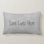 Love Lives Here Couples Personalised Lumbar Cushion<br><div class="desc">This custom throw pillow is designed with couples in mind and makes a wonderful gift for weddings, anniversaries, Valentine's Day or for every day occasions. Shown here in a subtle grey grunge colour, the front of the pillow contains a modern casual text font with the words "Love Lives Here". The...</div>