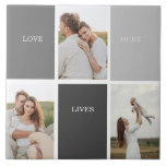 Love Lives Here | Three Photo Family Gift<br><div class="desc">Presenting a heartwarming and personalised gift that celebrates the essence of family, featuring a beautiful grey frame adorned with a touching "Love Lives Here" quote and three cherished photos. Every time the recipient catches a glimpse of this remarkable gift, their heart will be filled with fond memories and a profound...</div>