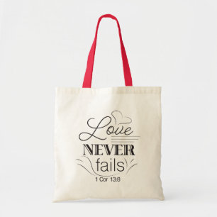 Love Never Fails tote Bag