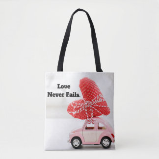 Love Never Fails Tote Bag