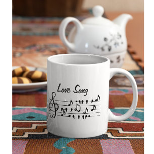Love song, birds sitting in between musical notes coffee mug