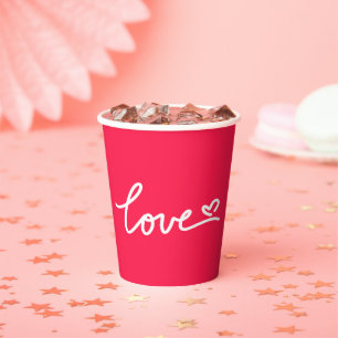 Love white text on pink paper cups