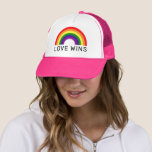 Love Wins Rainbow Colors LGBTQ Pride Month Trucker Hat<br><div class="desc">Celebrate Pride Month and show your support for the LGBTQ community with this colorful "LOVE WINS" trucker hat design (pink hat can be modified) with black modern text and a vibrant arched ROYGBV rainbow spectrum of colors.</div>