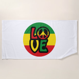 LOVE with peace symbol, reggae style Beach Towel