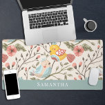 Lovely birds floral with name desk mat<br><div class="desc">This exquisite desk mat features a captivating illustration of two colourful cartoon birds in love surrounded by delicate flowers. This elegant keyboard pad adds a sophisticated touch of natural beauty to your workspace and is customisable with your name to create a unique and classy desk decor</div>